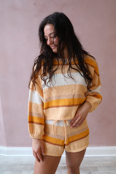 Step into the spotlight with the Sol Time Crew Neck Sweater from the Trip Around The Sun collection. Its 4-way stretch blended cotton fabric and boxy fit offer a unique twist on a classic. The metal plate and striped design complete the look.