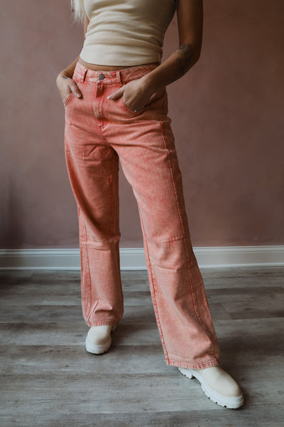 The washed pink wide leg pant is a stylish and versatile addition to any wardrobe. Their elegant design and comfortable fit make them a must-have for fashion enthusiasts.